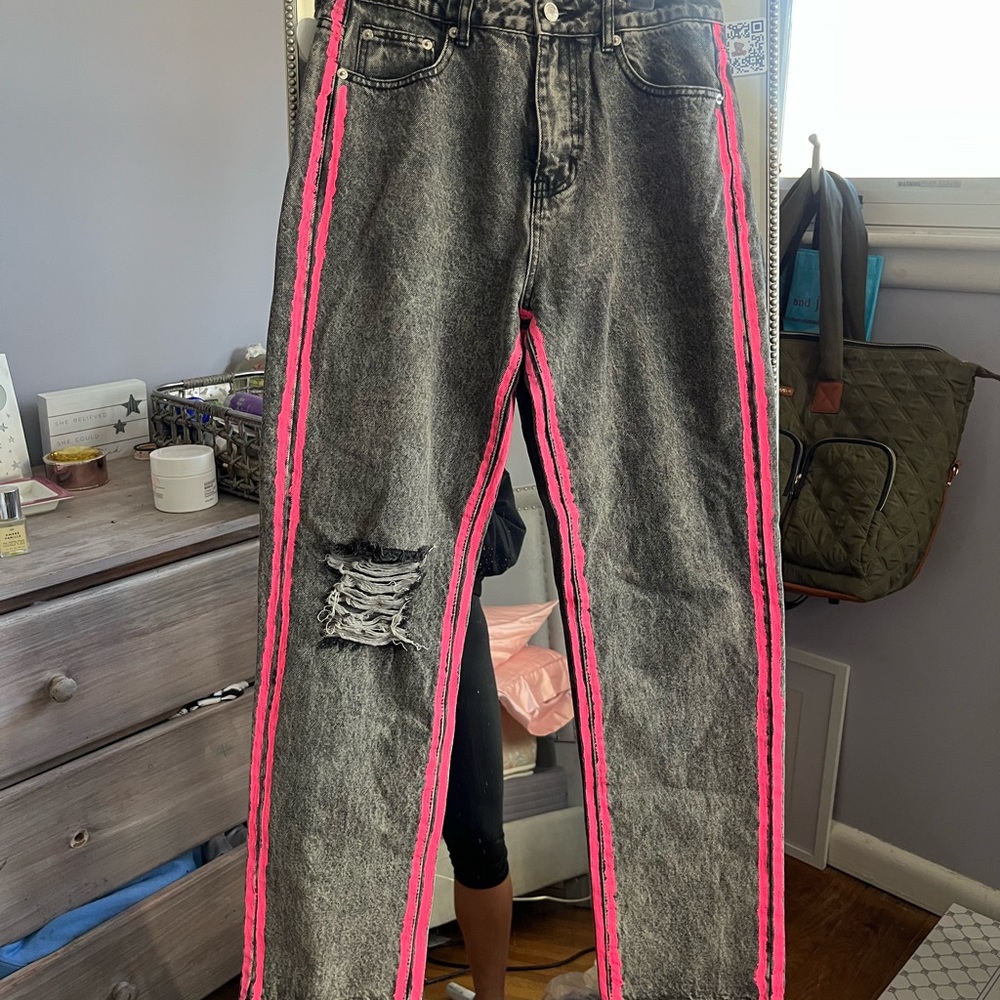 Dark wash mom jeans with pink detailing